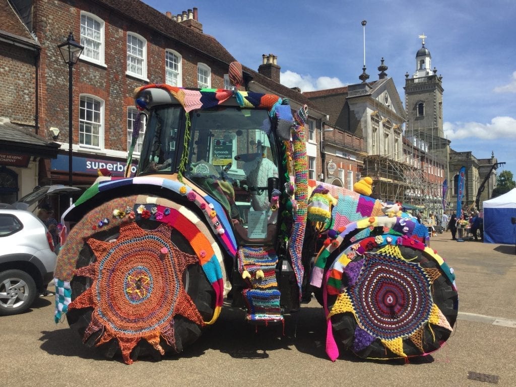 Yarn Bombed Tractor makes a splash C&O Tractors