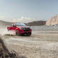 All-New-Isuzu-D-Max-V-Cross-Spinel-Red-Lifestyle-Shot_V-Cross-Spinel-Red-Quarry-Wheel-Spin_3845